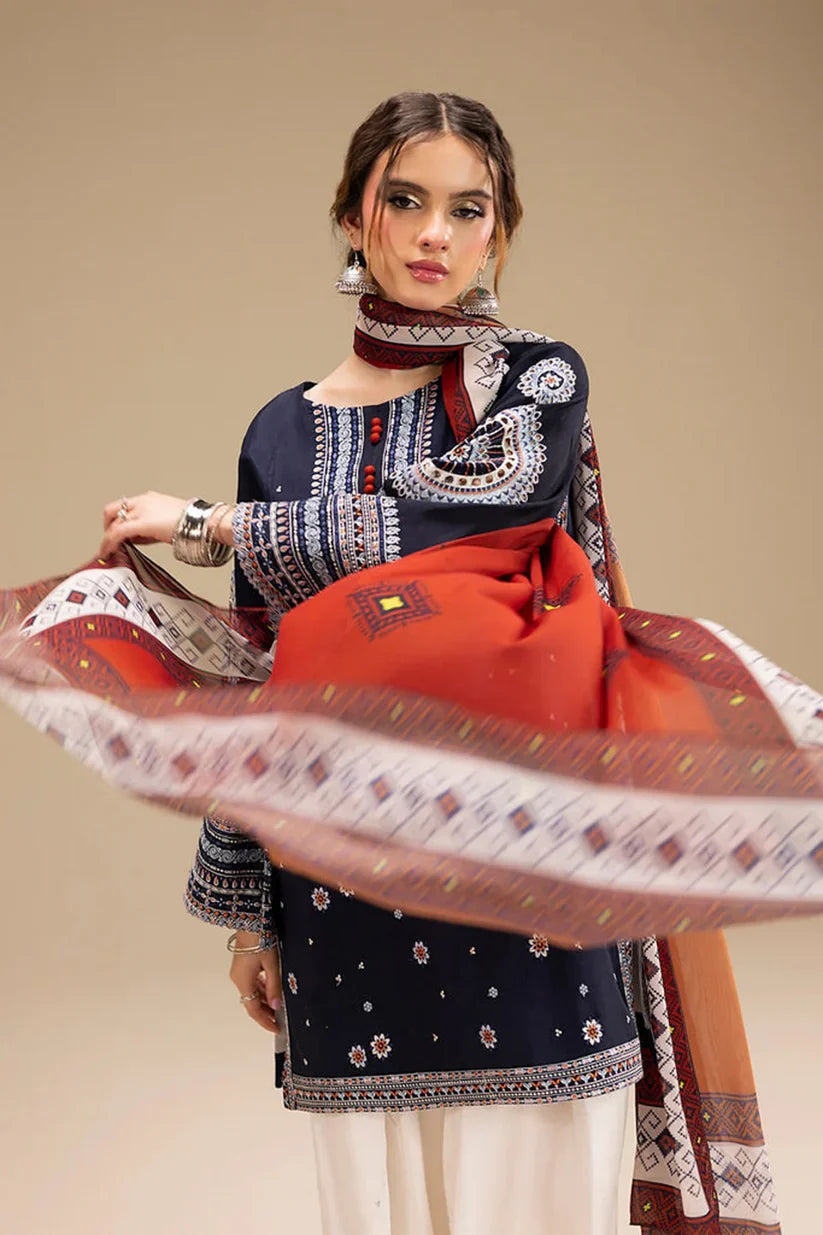 Woman wearing a traditional outfit with a red dupatta against a beige background