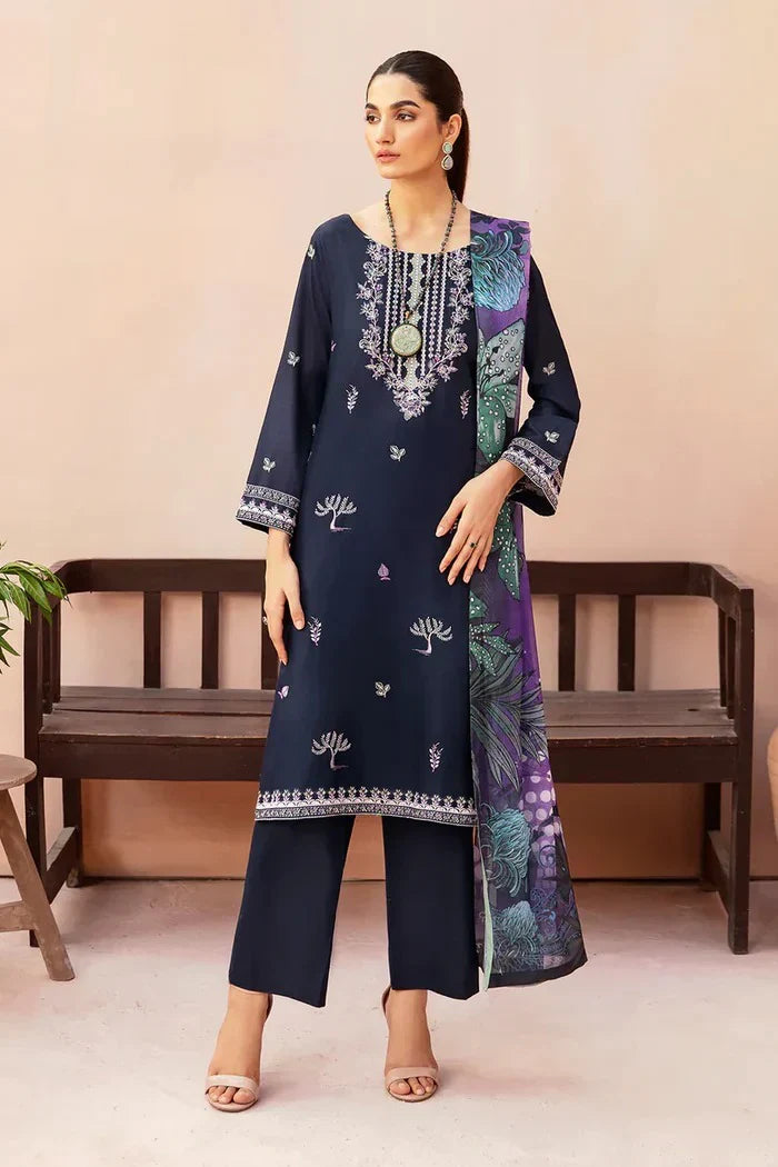 A woman modeling a three-piece Sapphire branded clothing outfit with embroidery and a dupatta.
